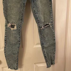 Acid wash blue jeans